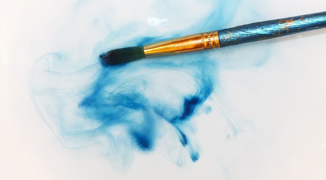 Brush closeup dip with watercolor paint